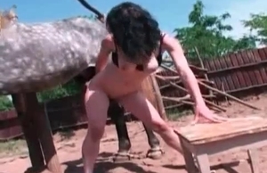 Slim woman with great tits is left all alone with a horse